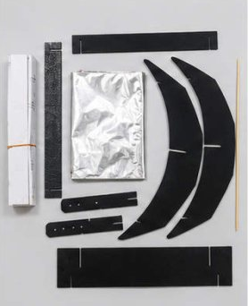 DIY solar cooker kit with curved reflective trough